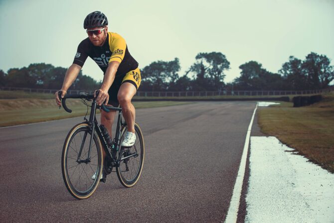 Chris Hoy cycling Lydden Hill circuit before testing in the rallycross car